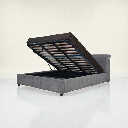 Gray upholstered bed with open headboard on a white background