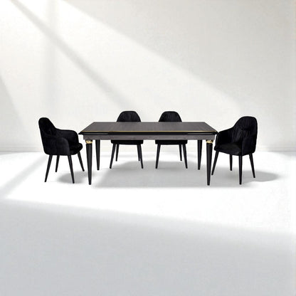 Dining table with four black chairs on a white background