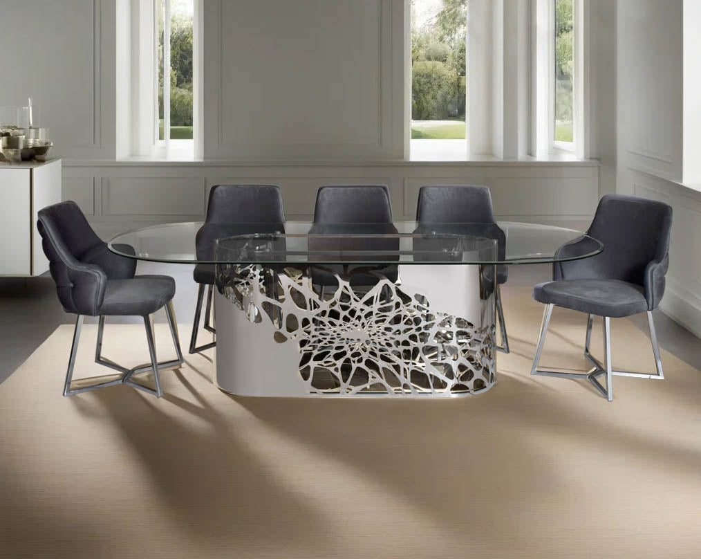 This exquisite & beautiful dining table with an artistic laser cut base in glossy stainless steel this soft, cushioned dining chair features an extraordinary contemporary design with tufted back and cushioned seat with stainless steel legs