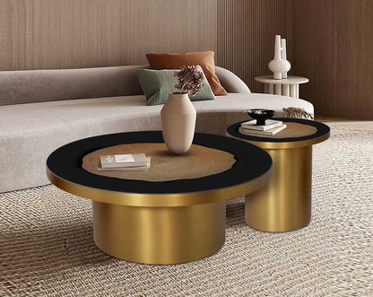 This sleek round black tempered glass with veneer inlay top coffee and End table with a tubular stainless steel matt gold finished base brings a rich contemporary luxurious style to any living room,